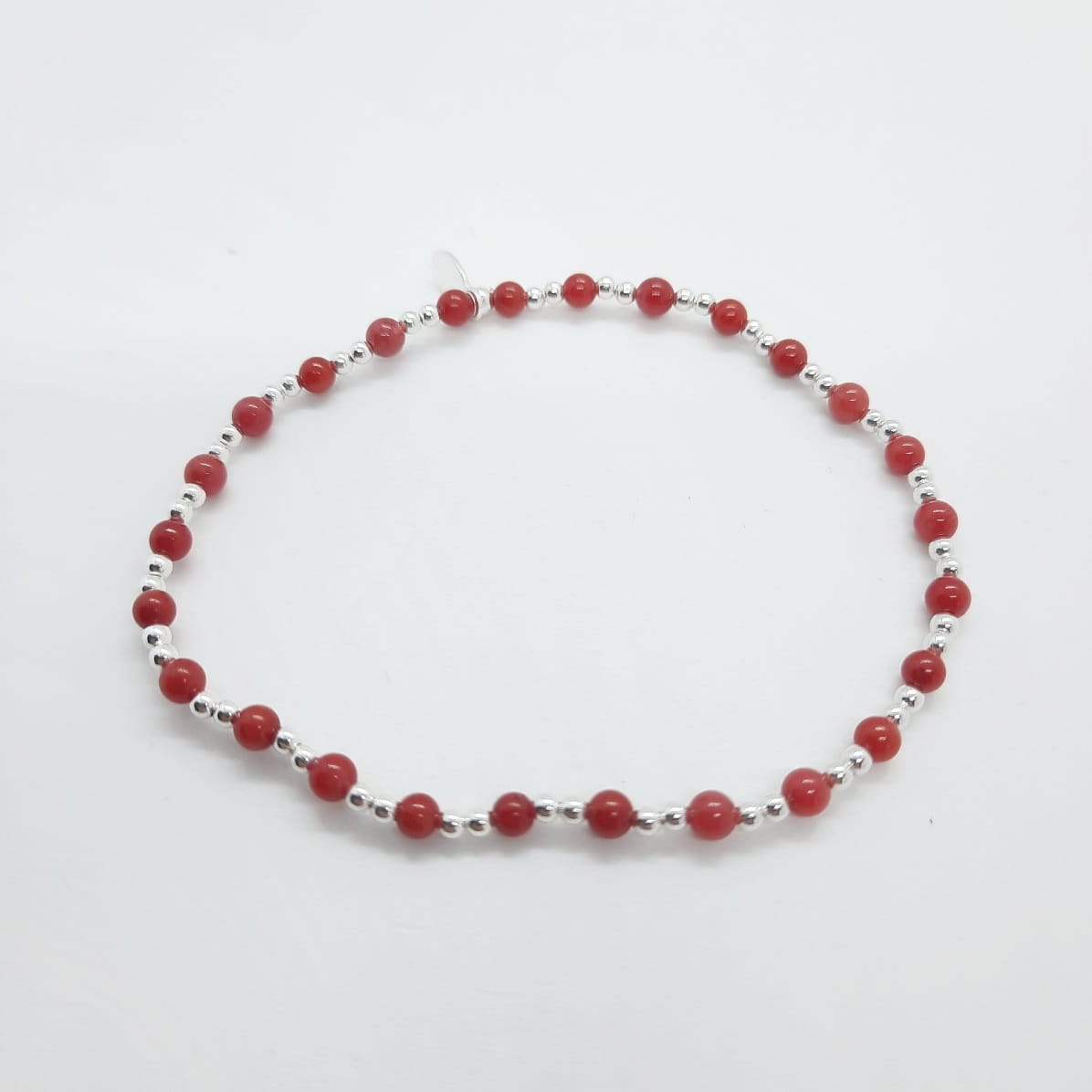 Armband aus Silber mit roten Perlen Armband KOOMPLIMENTS