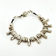 Armband mit iregulären Anhängern STALAKTITEN Armband KOOMPLIMENTS