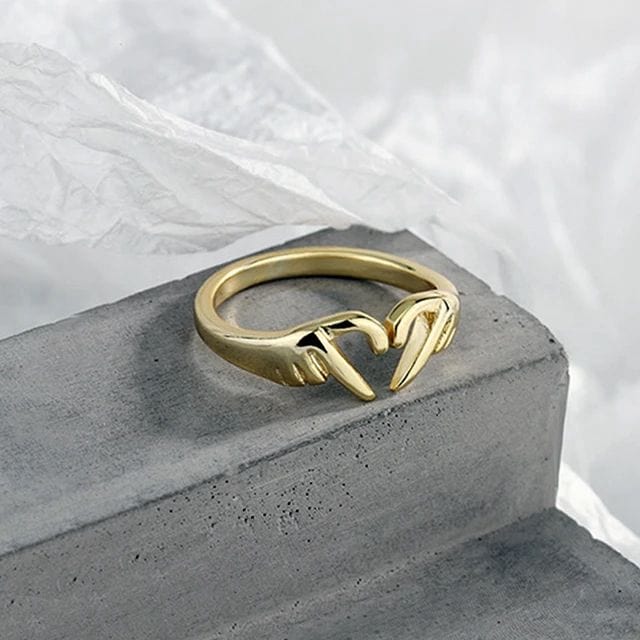 Ring mit herzförmigen Händen - Gold Ringe Dropi PRO