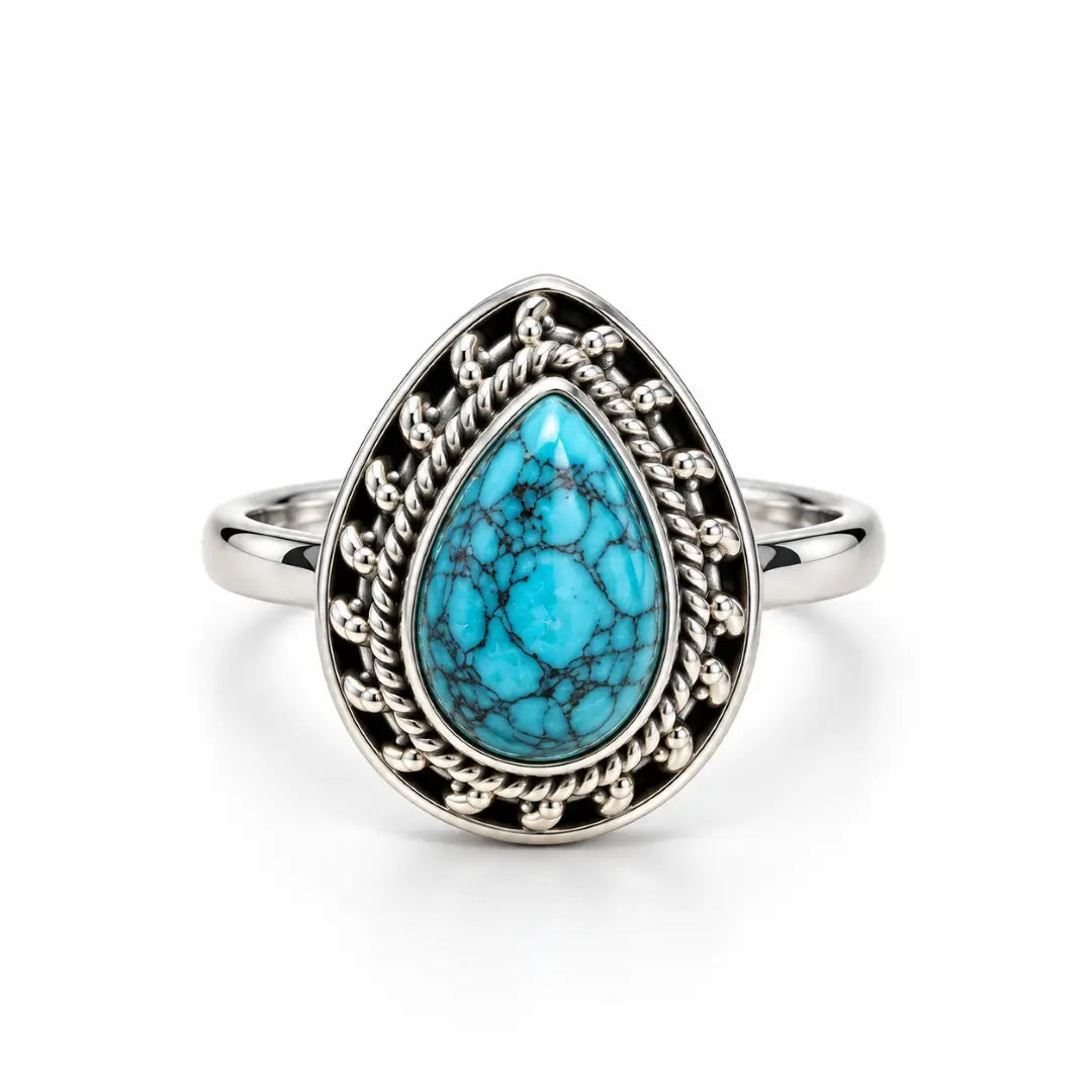 Ring mit türkisfarbenem Stein in Tropfenform KOOMPLIMENTS