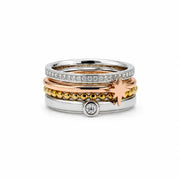 Set mit 4 Edelstahl Ringen mit Zirkonia und Stern Ringe KOOMPLIMENTS