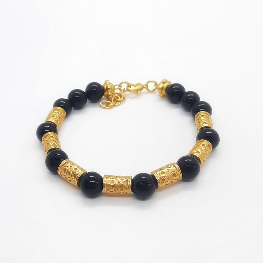 Armband mit Ethno-Zylinderperlen und schwarzen Onyx-Steinkugeln Armband KOOMPLIMENTS