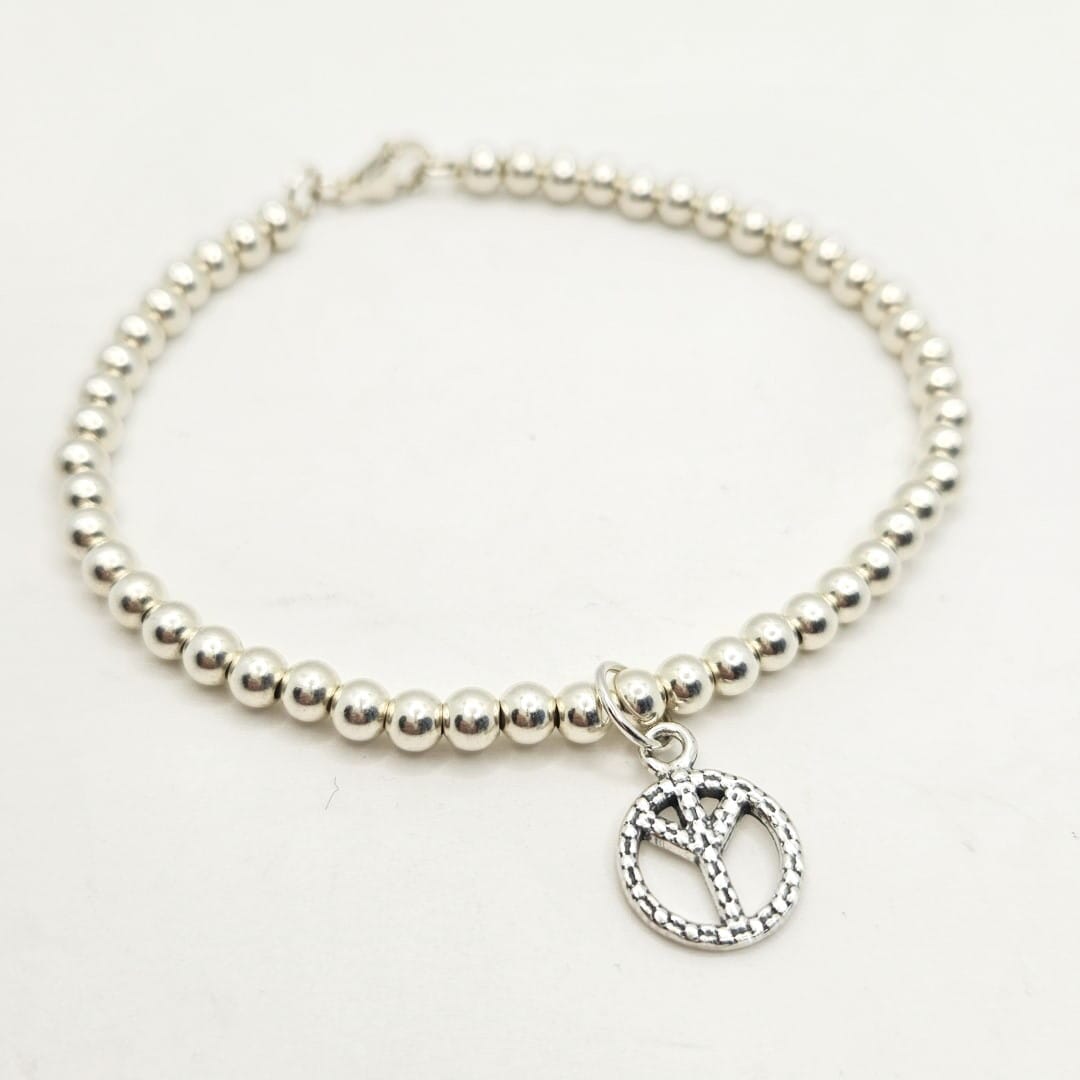 Armband mit Friedenssymbol Armband KOOMPLIMENTS