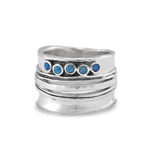 Wide silver ring with blue opals