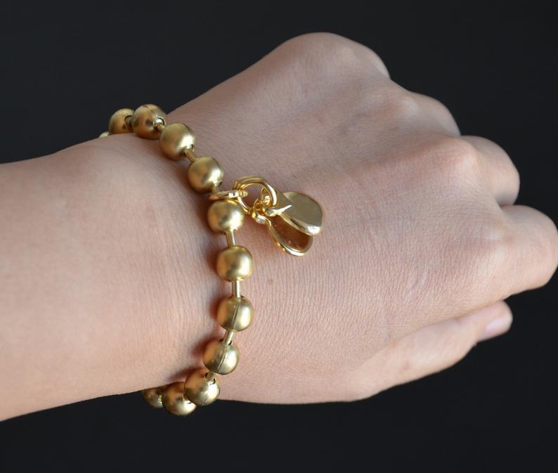 Spanisches Armband Gold mit Kastagnetten Armband KOOMPLIMENTS